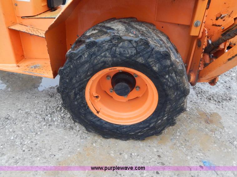 image for item H3913 2007 Almand TLB425ESL compact backhoe