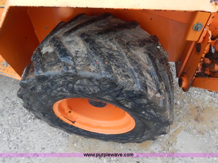 image for item H3913 2007 Almand TLB425ESL compact backhoe