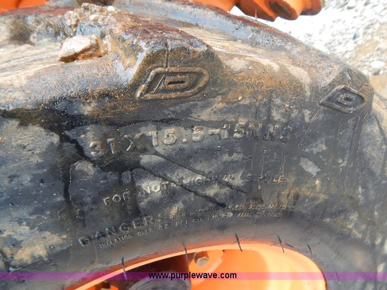 image for item H3913 2007 Almand TLB425ESL compact backhoe