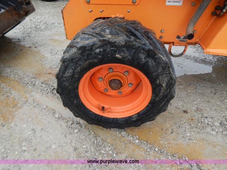 image for item H3913 2007 Almand TLB425ESL compact backhoe