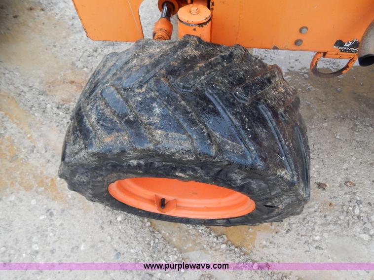 image for item H3913 2007 Almand TLB425ESL compact backhoe