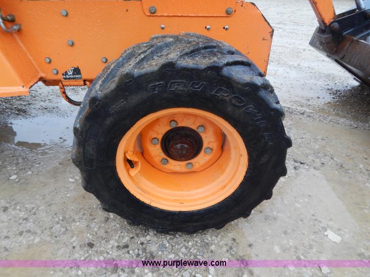 image for item H3913 2007 Almand TLB425ESL compact backhoe