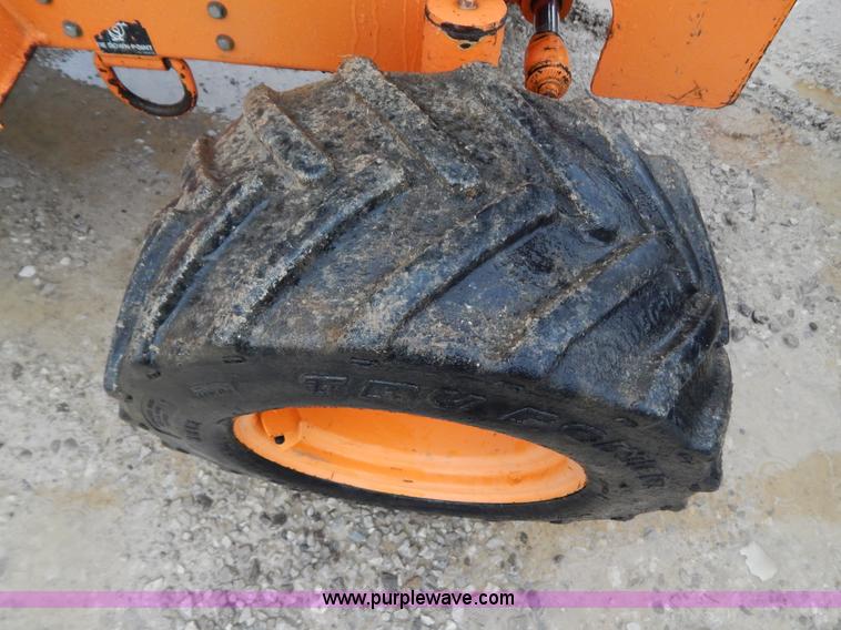 image for item H3913 2007 Almand TLB425ESL compact backhoe