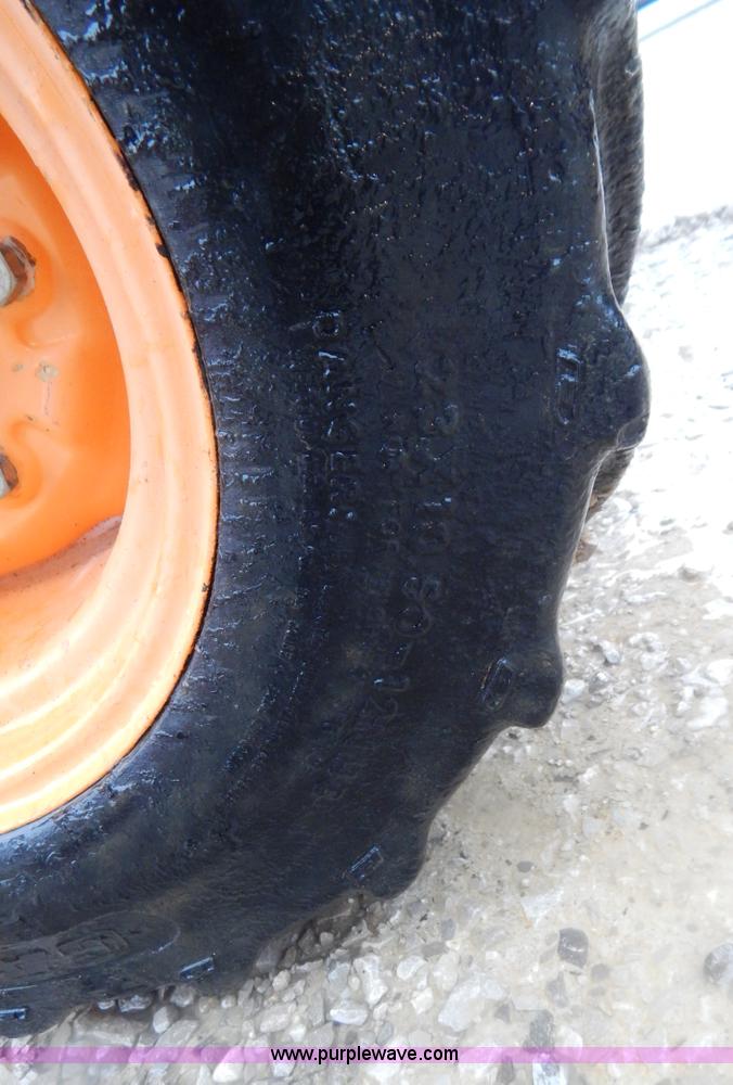 image for item H3913 2007 Almand TLB425ESL compact backhoe