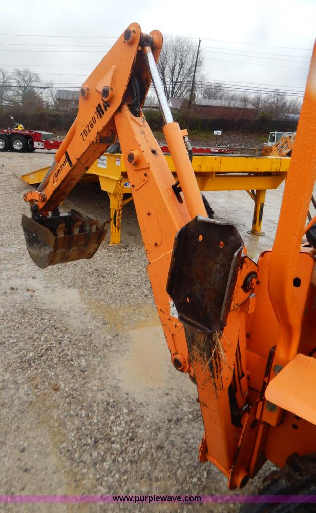 image for item H3913 2007 Almand TLB425ESL compact backhoe