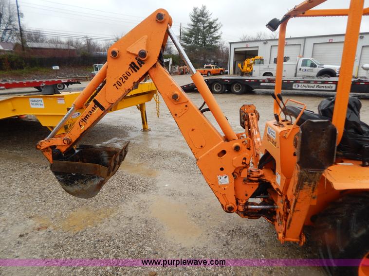 image for item H3913 2007 Almand TLB425ESL compact backhoe