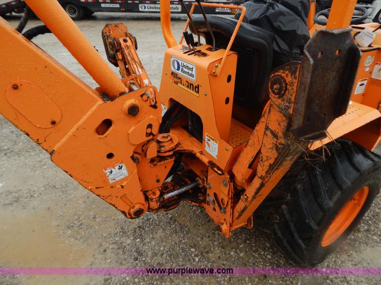 image for item H3913 2007 Almand TLB425ESL compact backhoe