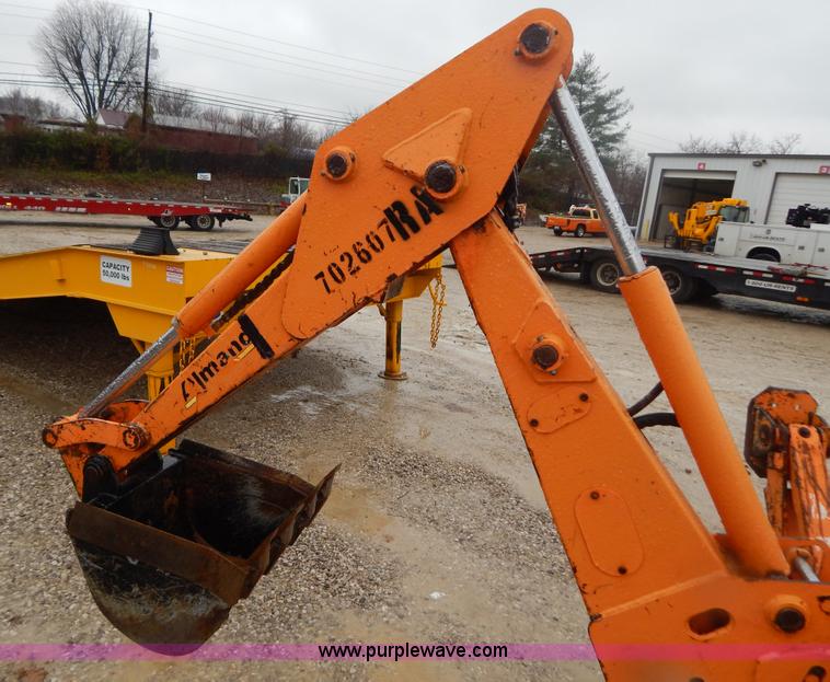 image for item H3913 2007 Almand TLB425ESL compact backhoe