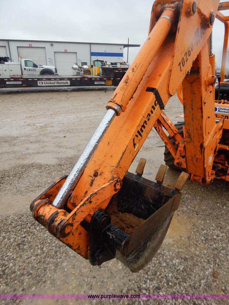image for item H3913 2007 Almand TLB425ESL compact backhoe