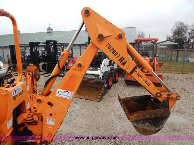 image for item H3913 2007 Almand TLB425ESL compact backhoe