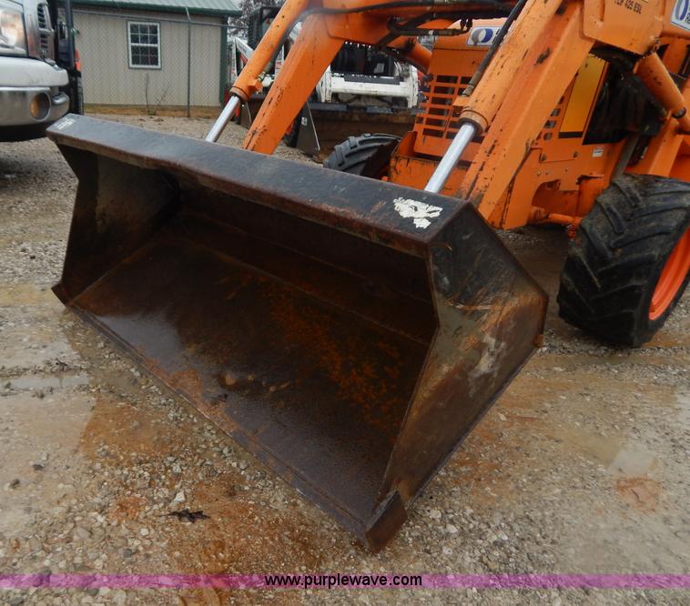 image for item H3913 2007 Almand TLB425ESL compact backhoe