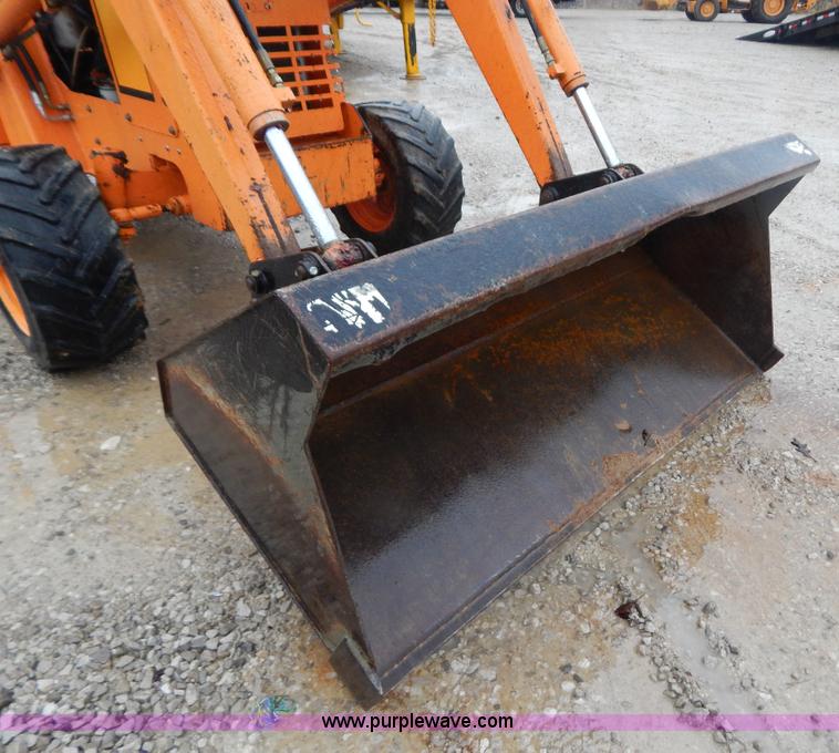 image for item H3913 2007 Almand TLB425ESL compact backhoe