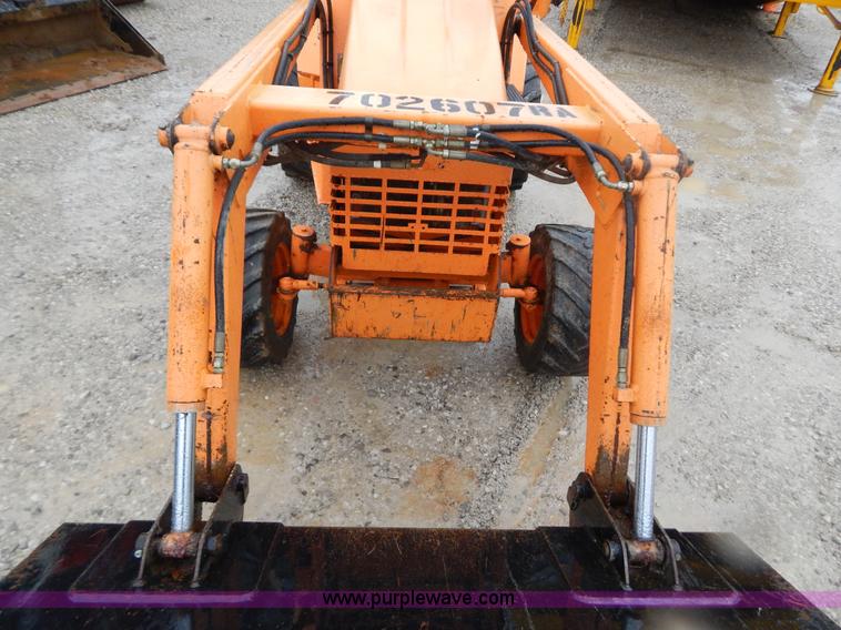 image for item H3913 2007 Almand TLB425ESL compact backhoe