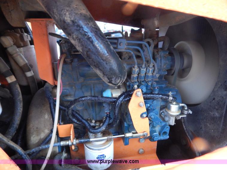 image for item H3913 2007 Almand TLB425ESL compact backhoe