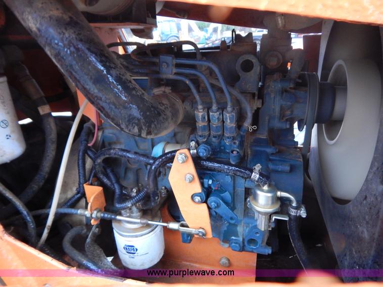 image for item H3913 2007 Almand TLB425ESL compact backhoe