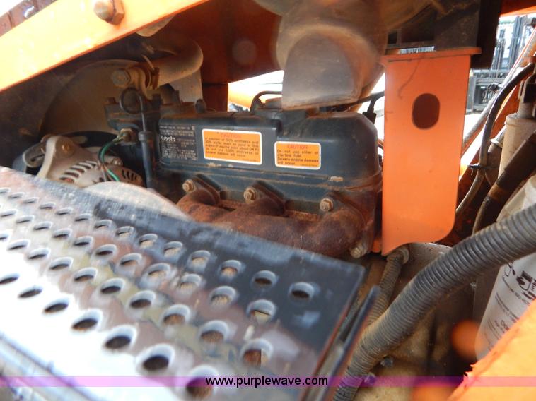 image for item H3913 2007 Almand TLB425ESL compact backhoe