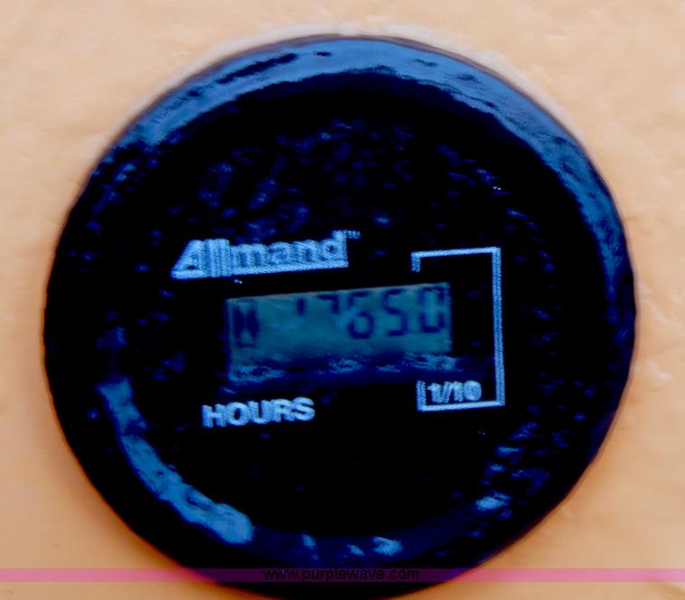 image for item H3913 2007 Almand TLB425ESL compact backhoe