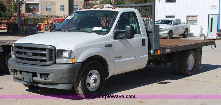 image for item H8392 2003 Ford F350 Super Duty XL stake truck