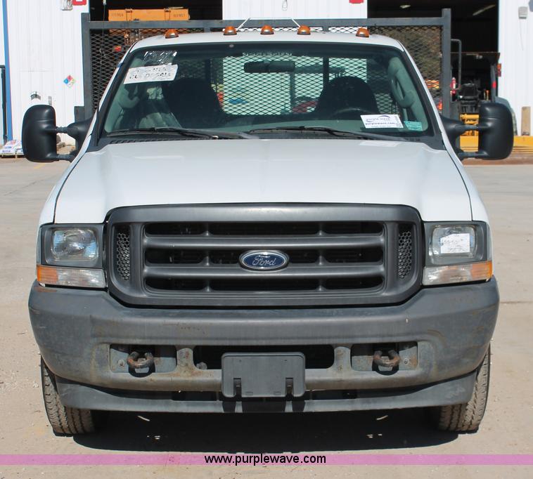 image for item H8392 2003 Ford F350 Super Duty XL stake truck