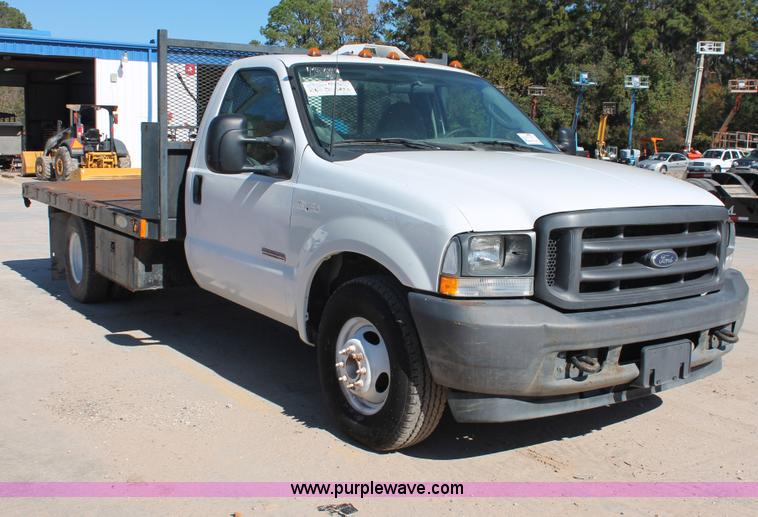 image for item H8392 2003 Ford F350 Super Duty XL stake truck