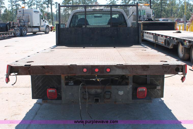 image for item H8392 2003 Ford F350 Super Duty XL stake truck