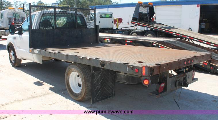 image for item H8392 2003 Ford F350 Super Duty XL stake truck
