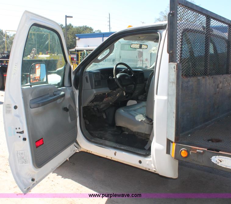 image for item H8392 2003 Ford F350 Super Duty XL stake truck