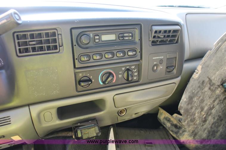 image for item H8392 2003 Ford F350 Super Duty XL stake truck