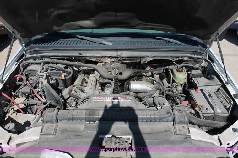 image for item H8392 2003 Ford F350 Super Duty XL stake truck