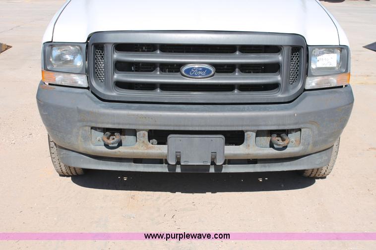 image for item H8392 2003 Ford F350 Super Duty XL stake truck