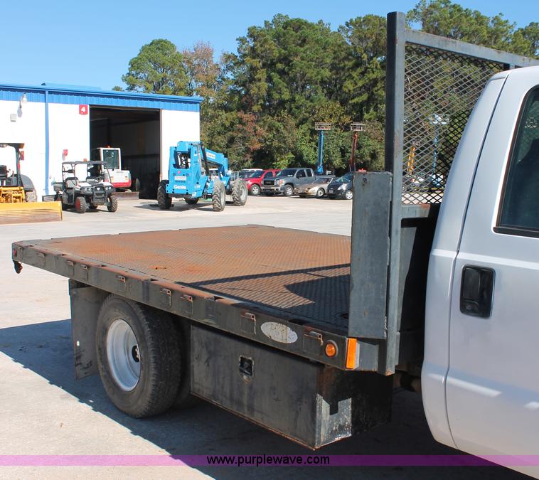 image for item H8392 2003 Ford F350 Super Duty XL stake truck