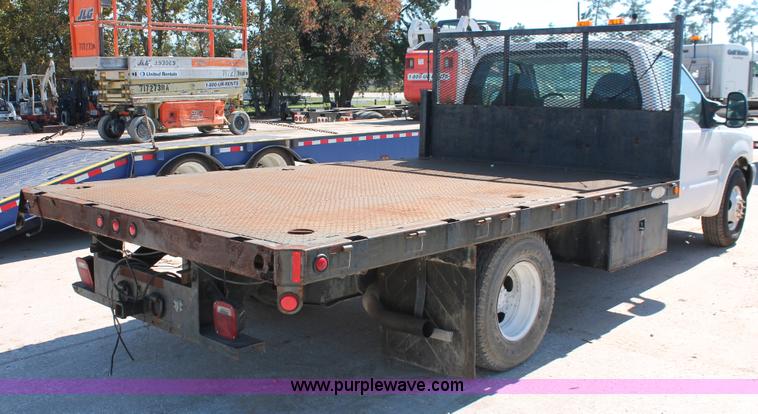 image for item H8392 2003 Ford F350 Super Duty XL stake truck