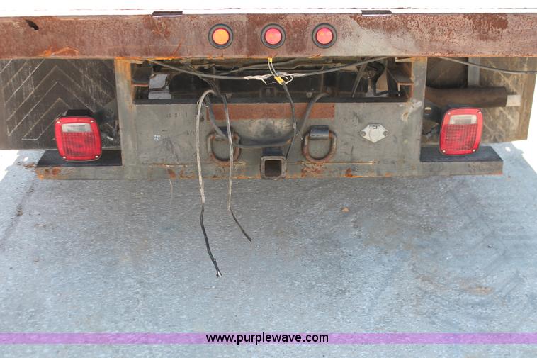 image for item H8392 2003 Ford F350 Super Duty XL stake truck