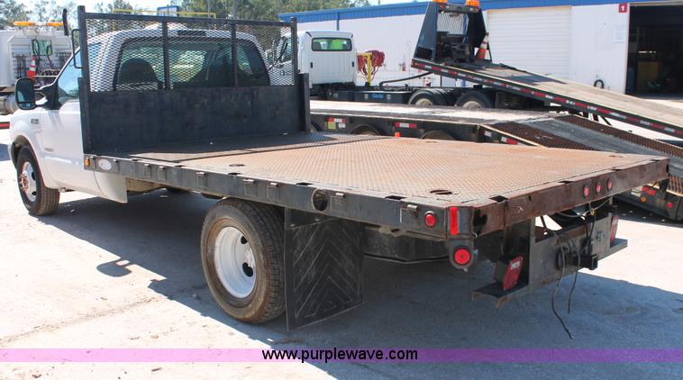 image for item H8392 2003 Ford F350 Super Duty XL stake truck