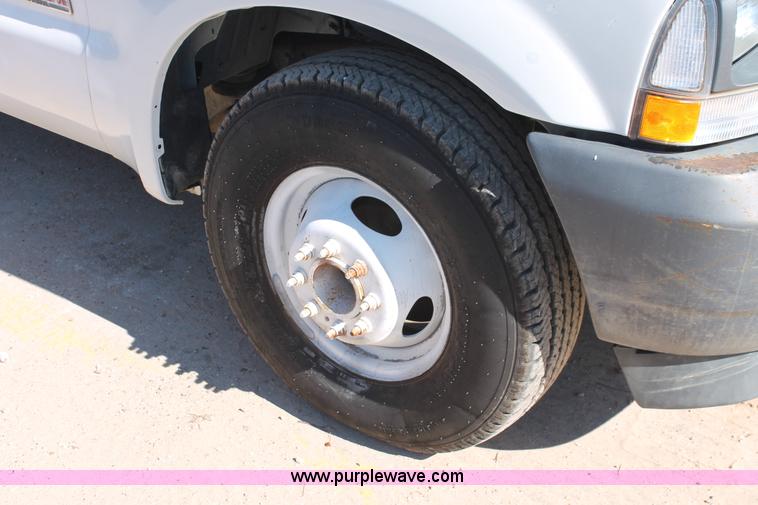 image for item H8392 2003 Ford F350 Super Duty XL stake truck
