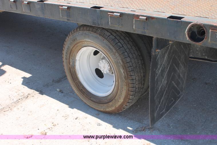 image for item H8392 2003 Ford F350 Super Duty XL stake truck