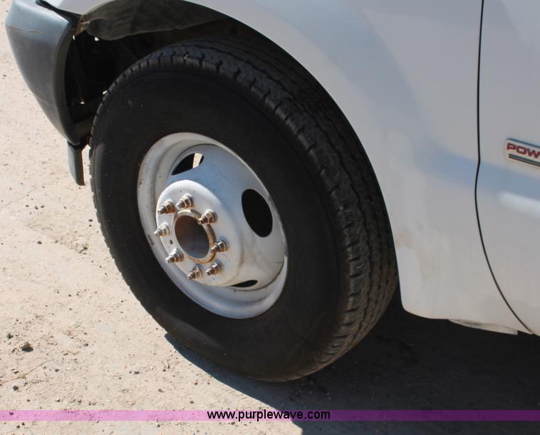 image for item H8392 2003 Ford F350 Super Duty XL stake truck