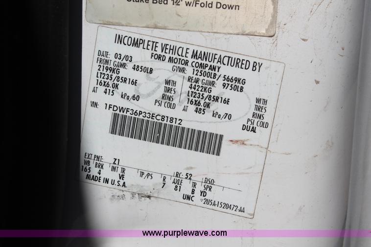 image for item H8392 2003 Ford F350 Super Duty XL stake truck