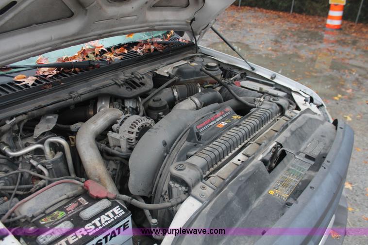 image for item H8399 2005 Ford F450 Super Duty XL stake truck