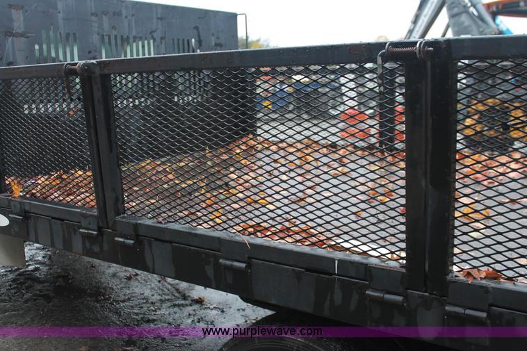 image for item H8399 2005 Ford F450 Super Duty XL stake truck