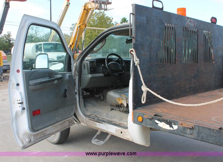 image for item H8411 2004 Ford F450 Super Duty XL stake truck