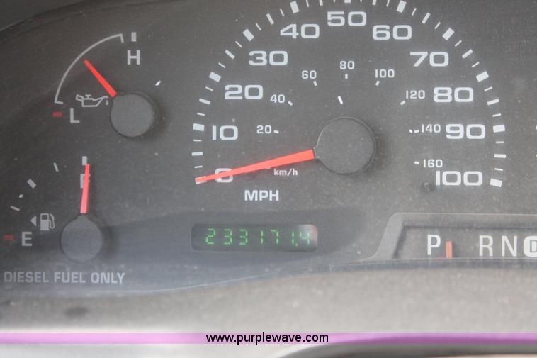 image for item H8411 2004 Ford F450 Super Duty XL stake truck