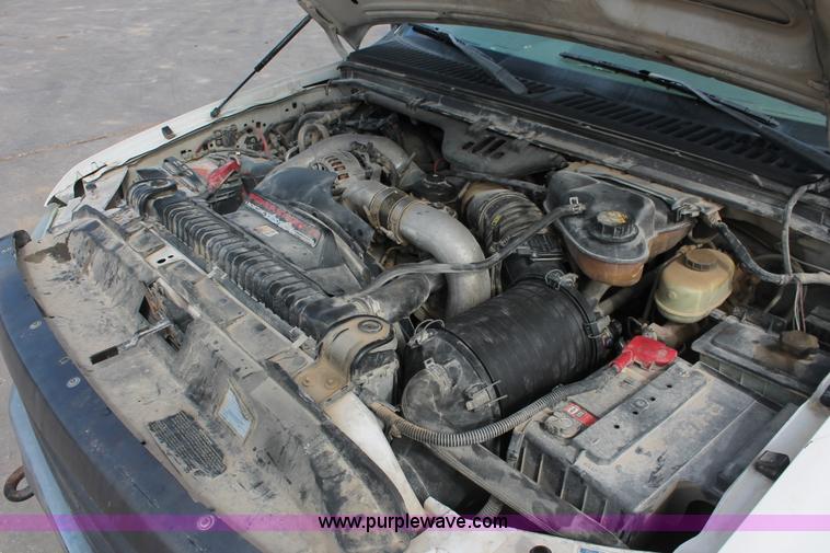 image for item H8411 2004 Ford F450 Super Duty XL stake truck