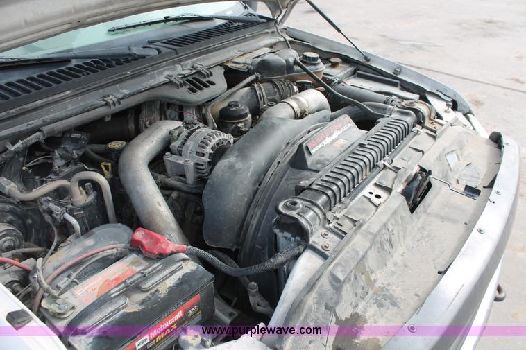 image for item H8411 2004 Ford F450 Super Duty XL stake truck