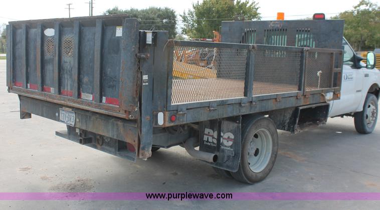 image for item H8411 2004 Ford F450 Super Duty XL stake truck