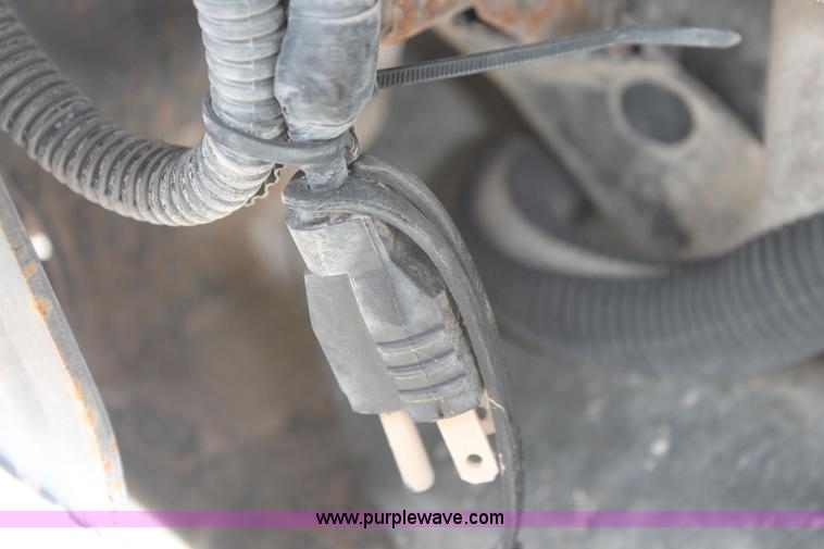 image for item H8412 2005 Ford F450 Super Duty XL stake truck