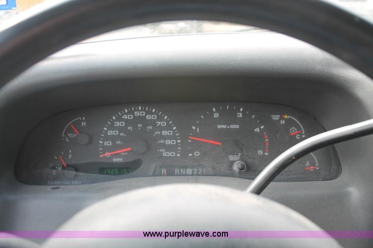 image for item H8413 2004 Ford F450 Super Duty XL stake truck