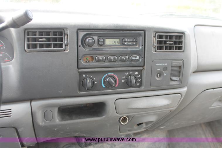 image for item H8413 2004 Ford F450 Super Duty XL stake truck