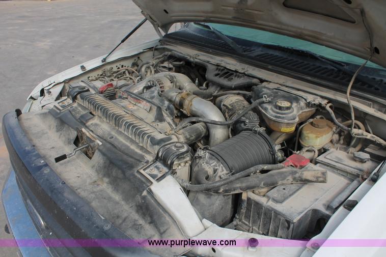 image for item H8413 2004 Ford F450 Super Duty XL stake truck