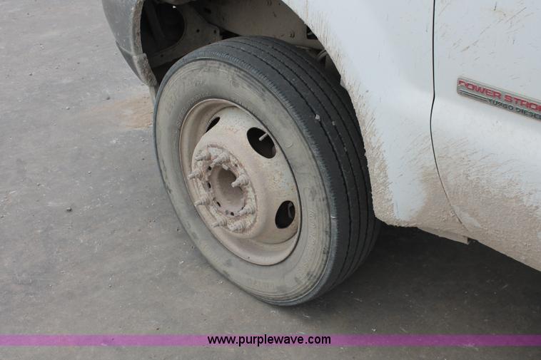 image for item H8413 2004 Ford F450 Super Duty XL stake truck